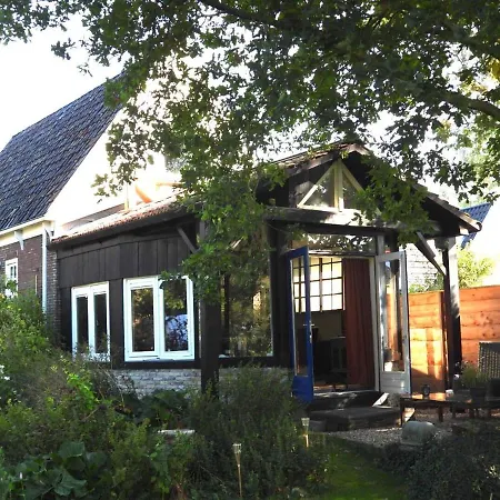 Vrijstaand Koetshuis Marron Alojamento de Acomodação e Pequeno-almoço Barsingerhorn